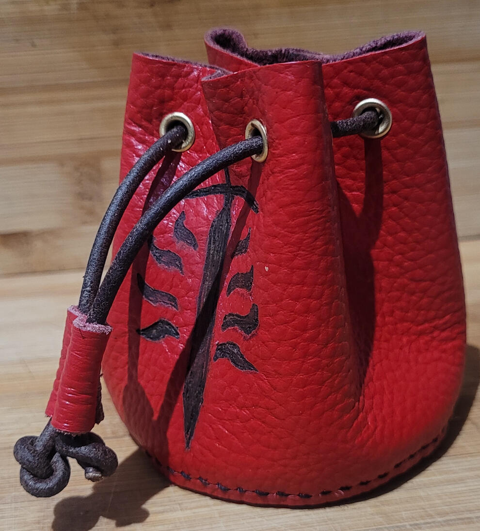 Made to order dice bag "Yes, I have received it! And it looks really amazing, thank you for the wooden token and the hand written letter, i really love the finish of the punch, i only now realize i need to find a matching dice set ;) Thank you so much for making this" - A happy